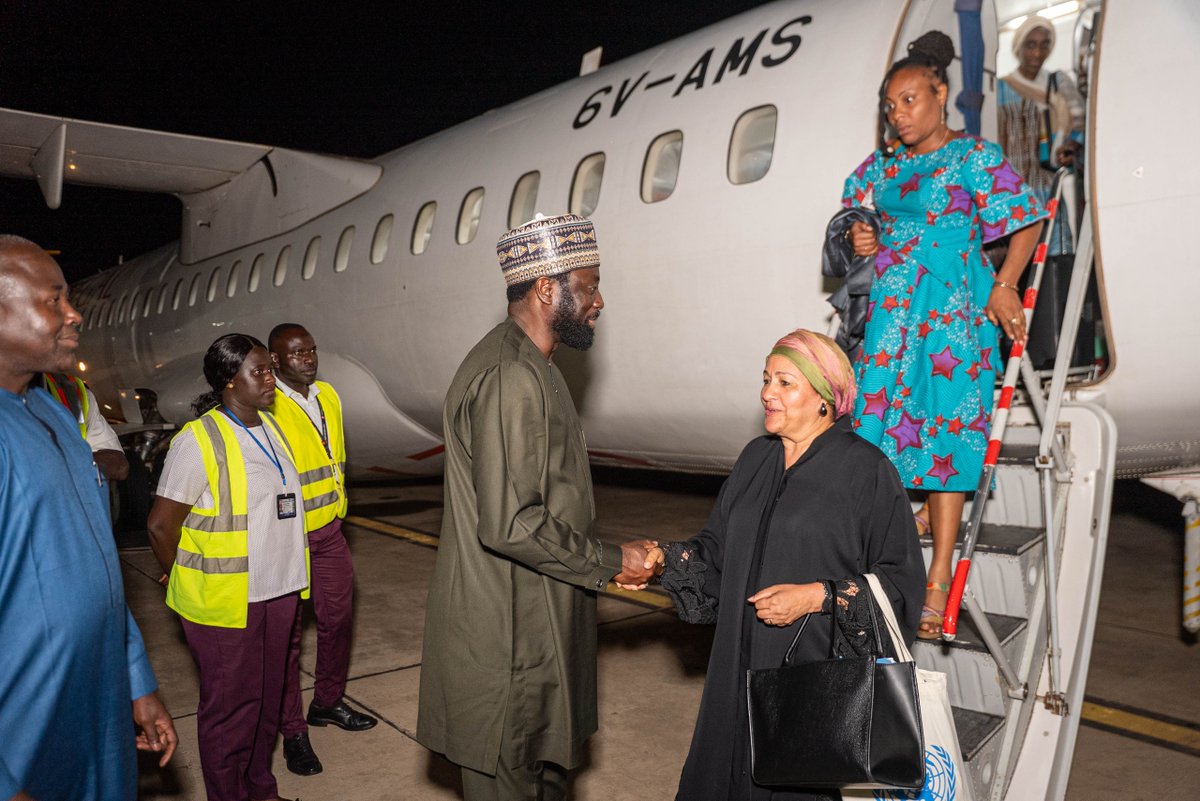 UNGambia's tweet photo. ✈️Touchdown in Banjul!

Deputy UN Secretary General @AminaJMohammed warmly welcomed by @MOFAGambia Foreign Minister H.E. @HeTangaraM  and @UN_Gambia Resident Coordinator @karlfredpaul. 

During her visit, DSG will engage with govt officials and key partners on #SDG acceleration. https://t.co/h9AbiV0nOG