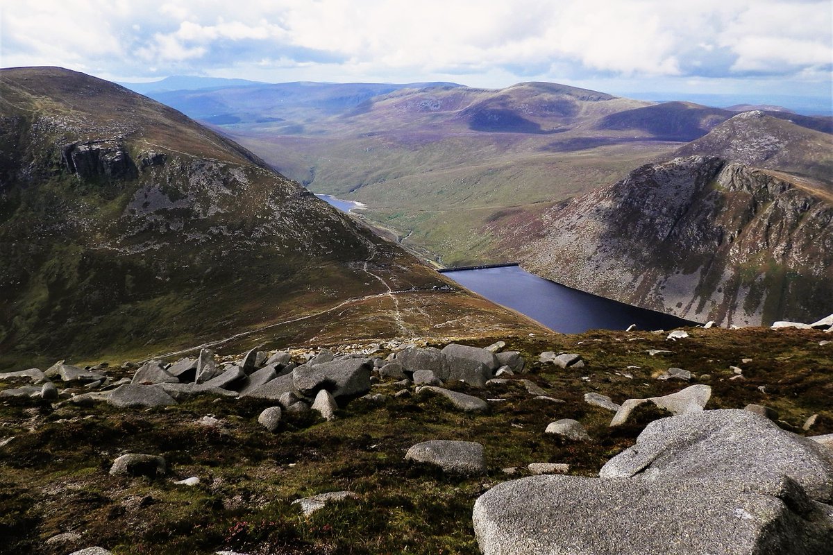 The view from Slieve Lamagan with Ben Crom to the west and a sneak peek of Silent Valley further south.  At 704 metres, Lamagan is the smallest of the seven peaks over 700 metres, but the southern descent towards the col between it and Binnian will test the hardiest hillwalker.