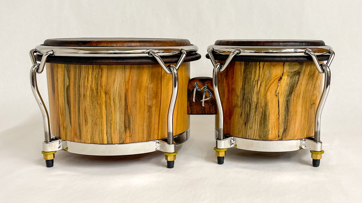 manitoperc's tweet photo. We recently finished these drums for Manito's sister. These solid shell spalted rock maple bongos were made with wood sourced sustainably from Athens, GA. They feature our handmade 304 stainless steel hardware, satin finish and steer skins. https://t.co/qvCGfOThCp