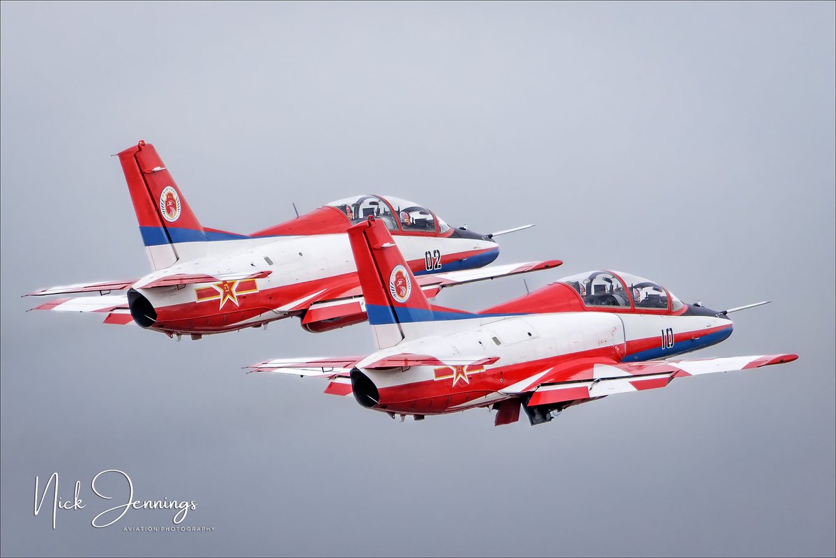 darealnjennings's tweet image. A pair of Hongdu JL-8s of the Hongying (Red Eagles) Aerobatic Team departing Zhuhai for their display.