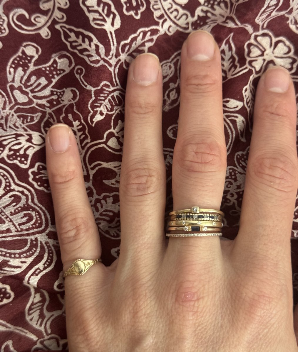 I got promoted so I bought myself another tiny 14k gold ring because I always dreamt of being the kind of woman who wore many tiny gold rings (second from the bottom).