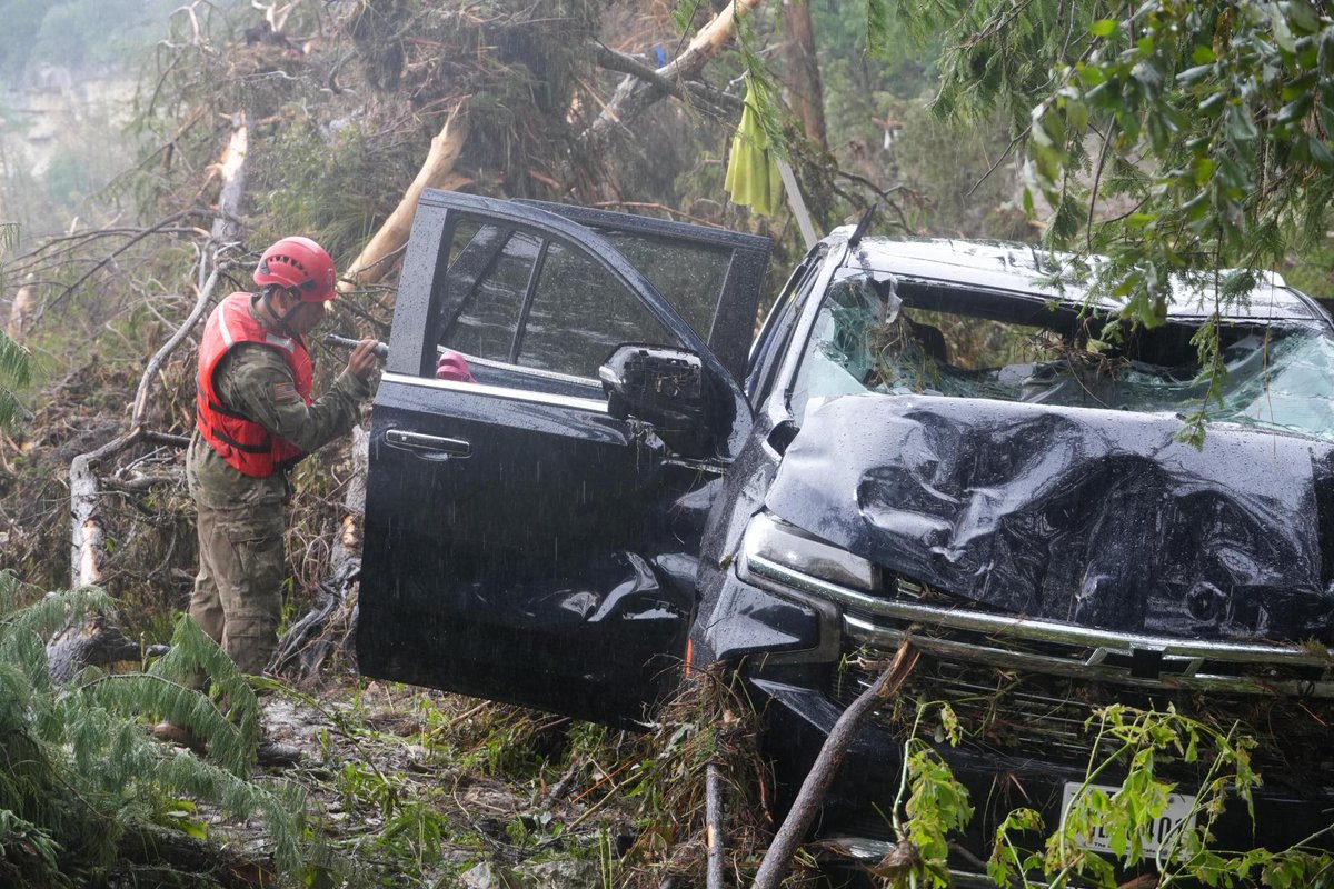 TXMilitary's tweet image. Texas National Guard service members assigned to Task Force Storm work in teams along the Guadalupe River bank conducting search and rescue operations and removing debris near Camp Mystic in Kerr County, Texas.