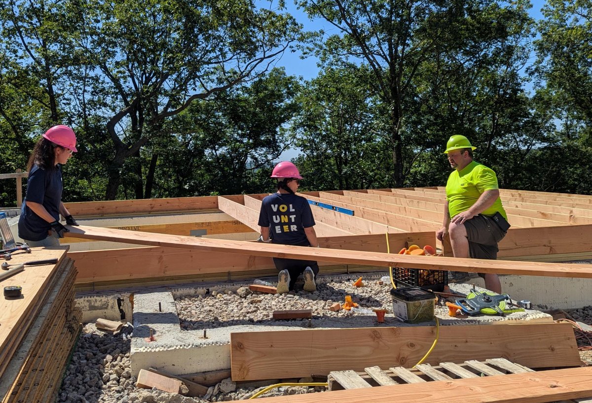 Record high temperatures didn’t stop our C&amp;F volunteers who participated in a Morris Habitat for Humanity build, recently. They spent the morning laying floor supports for balconies on newly constructed homes, helping to create safe, comfortable spaces for families in need.