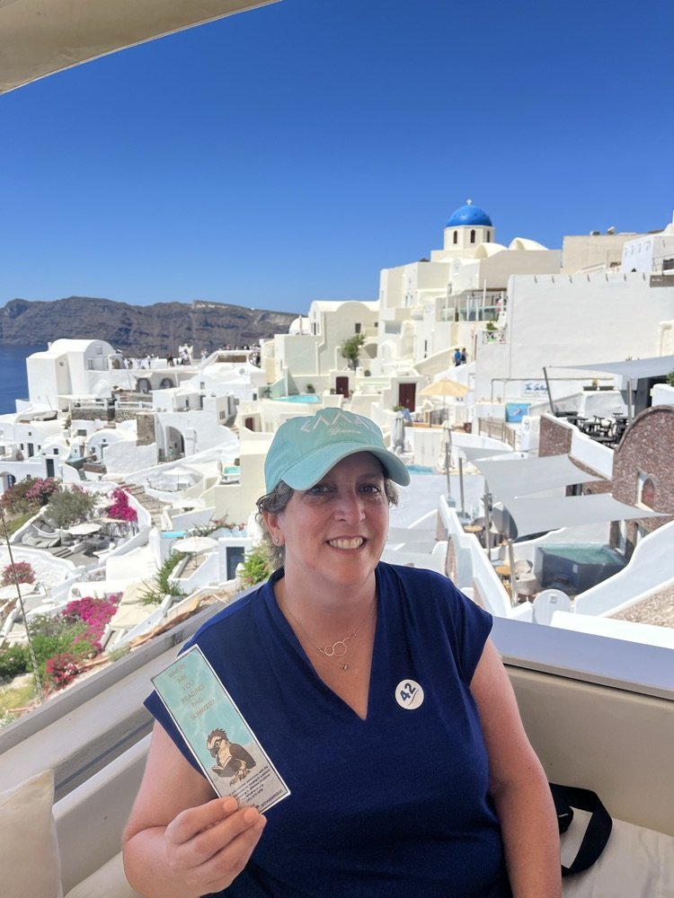 Ms. Bresson is reading her way around Europe!  Today she was reading in Santorini! Where are you reading this summer? #ParkPRIDE #BelongGrowSucceed #SummerReading