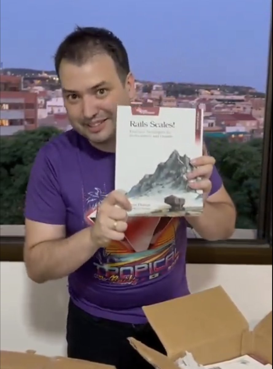 Heading to #Railsconf? Check out <a href="/cirdesh/">Cirdes Henrique</a>'s invitation to São Paulo 🌴  <a href="/tropicalonrails/">Tropical on Rails</a> is a great conference - Pragprog author <a href="/crplanas/">Cristian Planas 🇪🇺</a> spoke this year, and even wore the Tshirt in his unboxing video for his new book, Rails Scales!