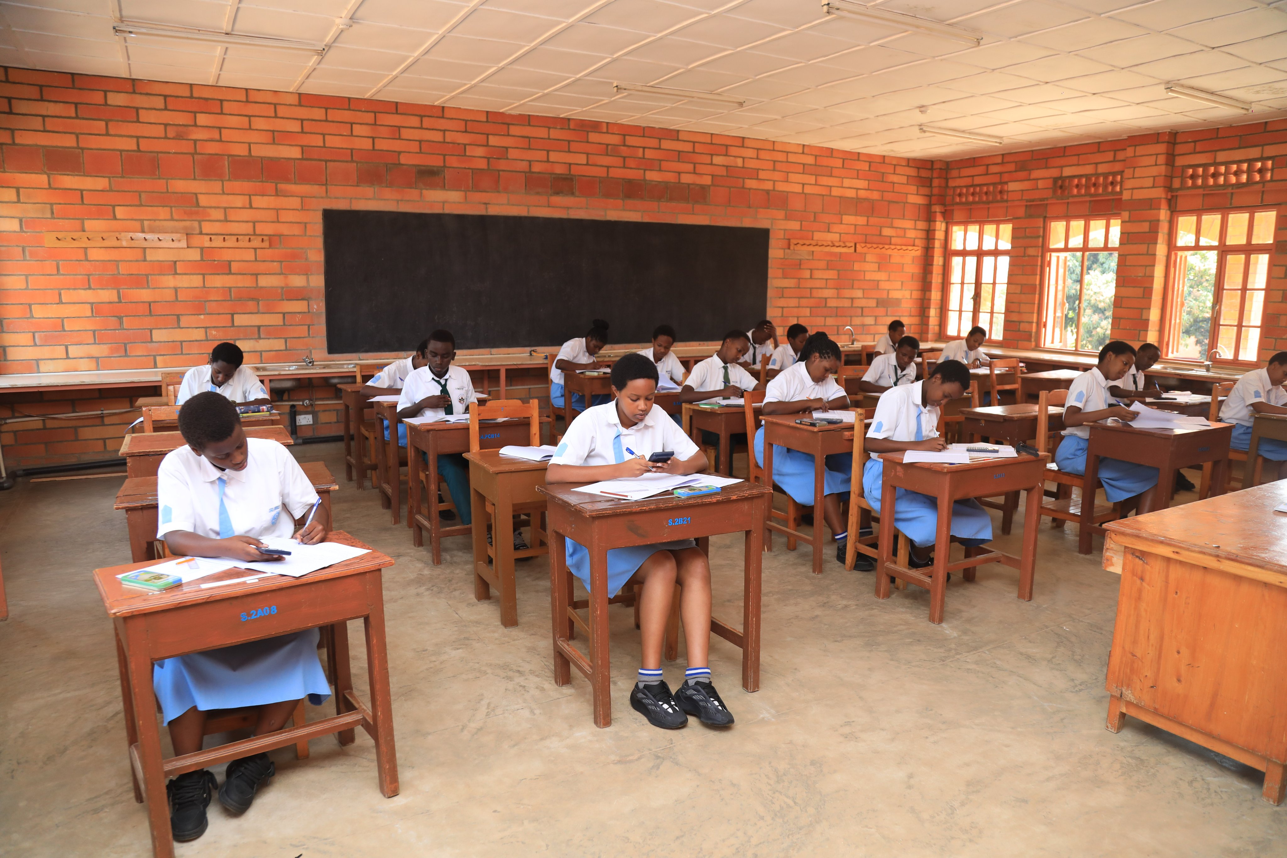 Students in Rwanda began national exams, reflecting an increase in participation and gender equality progress.