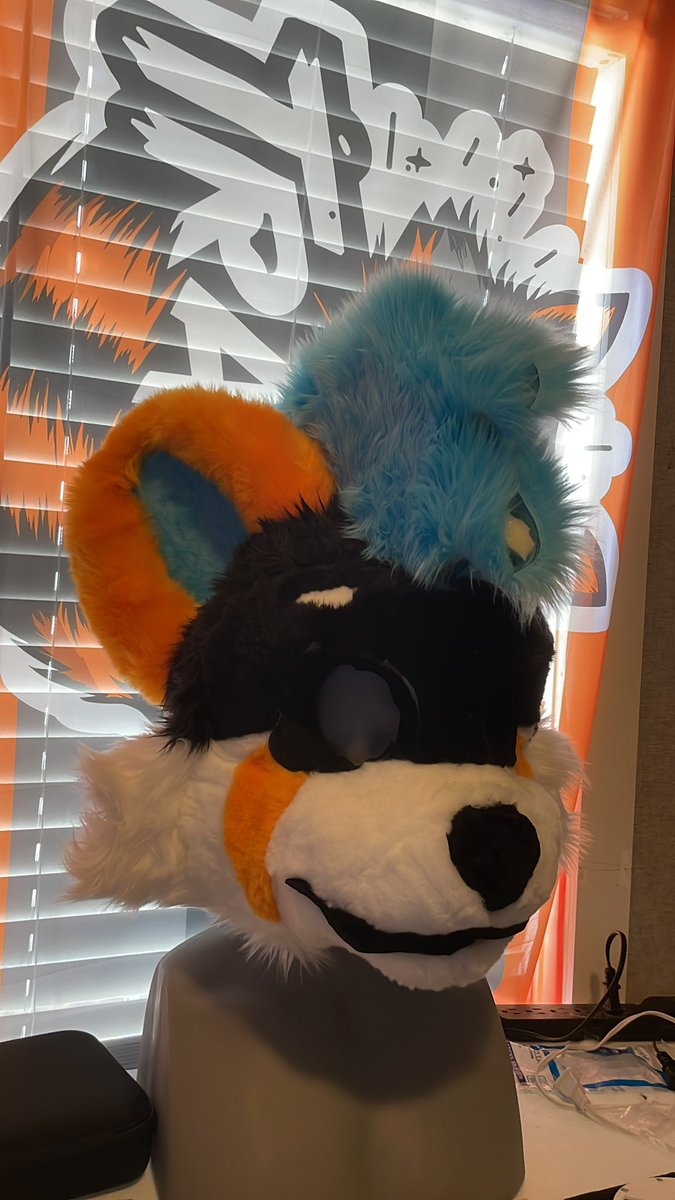 TrashysAlley's tweet image. This red panda suit will be completed and up for sale in time for CHOMP 💙🧡💙🧡