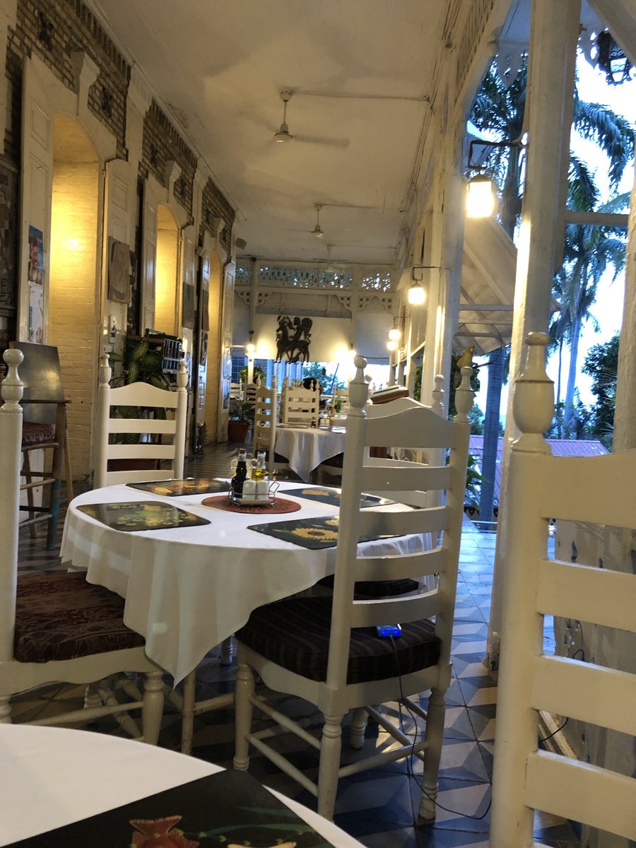 amywilentz's tweet image. Oloffson terrace. Waiting for dinner. Here’s to Dieuse and Errold and Denise and all the others who worked here and were part of visitors’ lives. And to the late Alix Toyo and the late Milfort Brino who helped guide hapless hacks around the capital city.