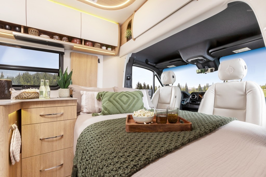leisurevans's tweet photo. The dinette of the Unity Rear Lounge converts into an optional inflatable bed system, making smart use of the front swivel chairs. With four seatbelts, the Unity Rear Lounge is perfect for those special trips with the grandkids. https://t.co/YQQBjYhHNd #ExploreWithUnity https://t.co/1JBdJ1Kqr3
