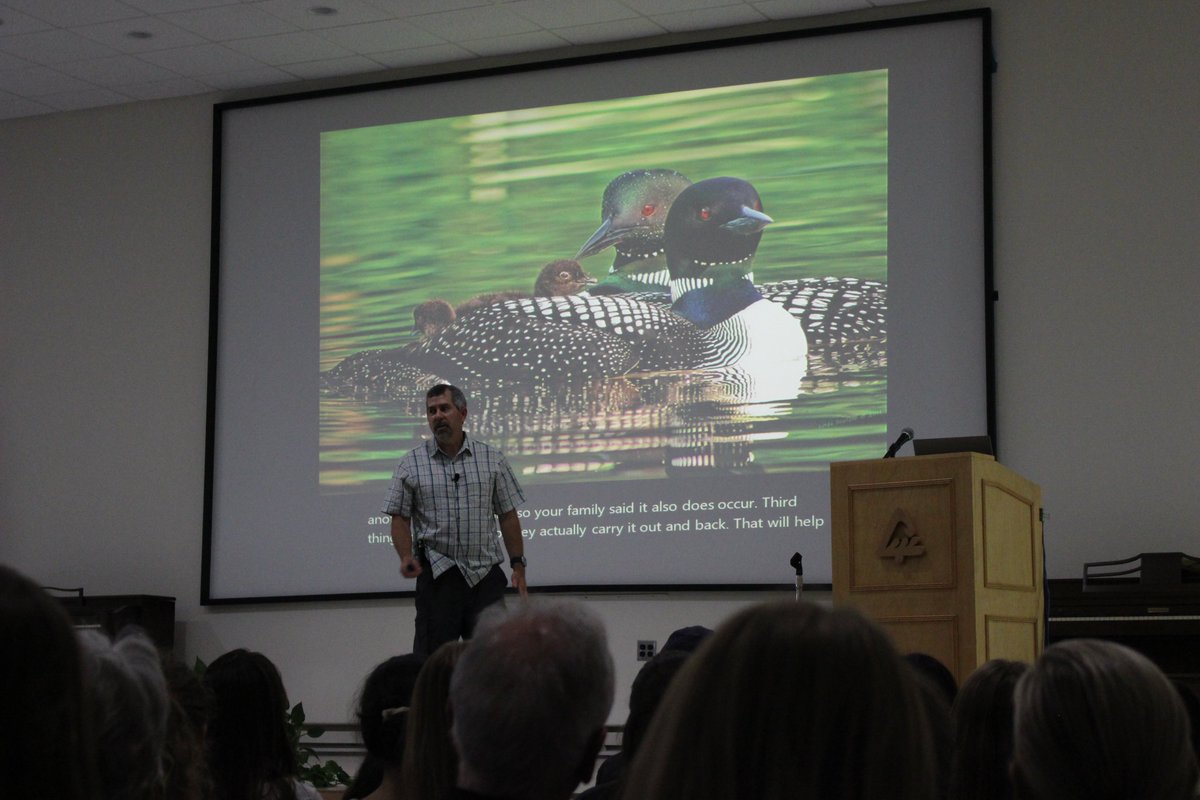 UMBS's tweet image. Loon lovers across northern Michigan visited the @UMich Biological Station last week to hear loon biologist Jay Mager. Read the fascinating story behind the charismatic northern diver known for alluring, distinctive calls: myumi.ch/pVdPZ