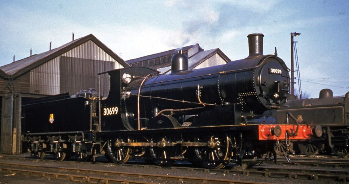 Looking fit as a fiddle with polished brass &amp; a fresh coat, Drummond 'Black Motor' 30699 awaits a return to Nine Elms from Eastleigh following an overhaul in 1954. A Dübs product of May 1897, it'd been rebuilt with a superheater 30 years later in 1927 under the order of Maunsell.