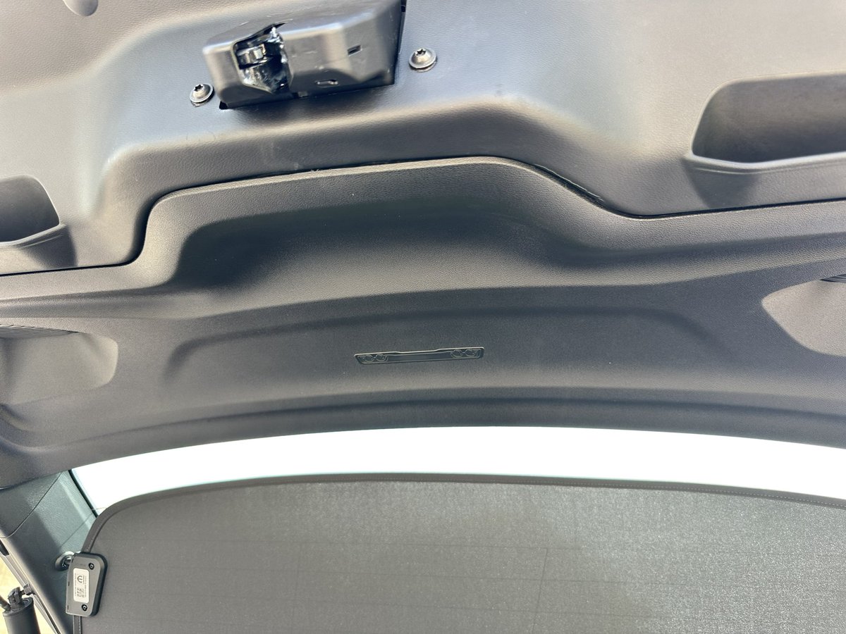 Autoline's tweet image. Spoiler alert. Found: one “Easter Egg” on the Dodge Charger EV. Inside the lift gate. There are more, someplace.