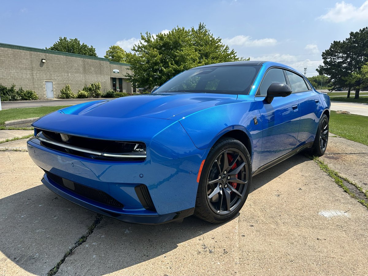 Autoline's tweet image. Spoiler alert. Found: one “Easter Egg” on the Dodge Charger EV. Inside the lift gate. There are more, someplace.