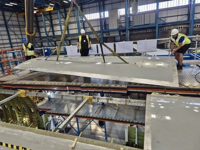 STS advances its second production line in Manchester with another 777-200LRMF destined for DHL.

The upper sill cut has been completed and the final door surround structure is well underway.