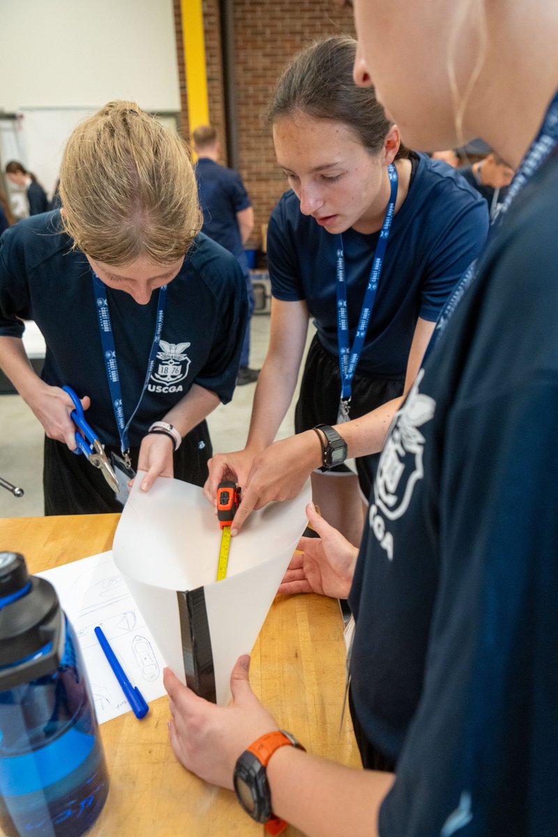 USCGAcademy's tweet photo. 🔧⚓ This week, AIMsters stepped into the world of Engineering to get hands-on with boat building fundamentals. They explored the engineering behind Coast Guard missions and learned what it takes to keep our fleet afloat.
#CGAIM #FutureLeaders #USCGA #AIM2025 #ServiceThroughSTEM https://t.co/VWsyLdnplt