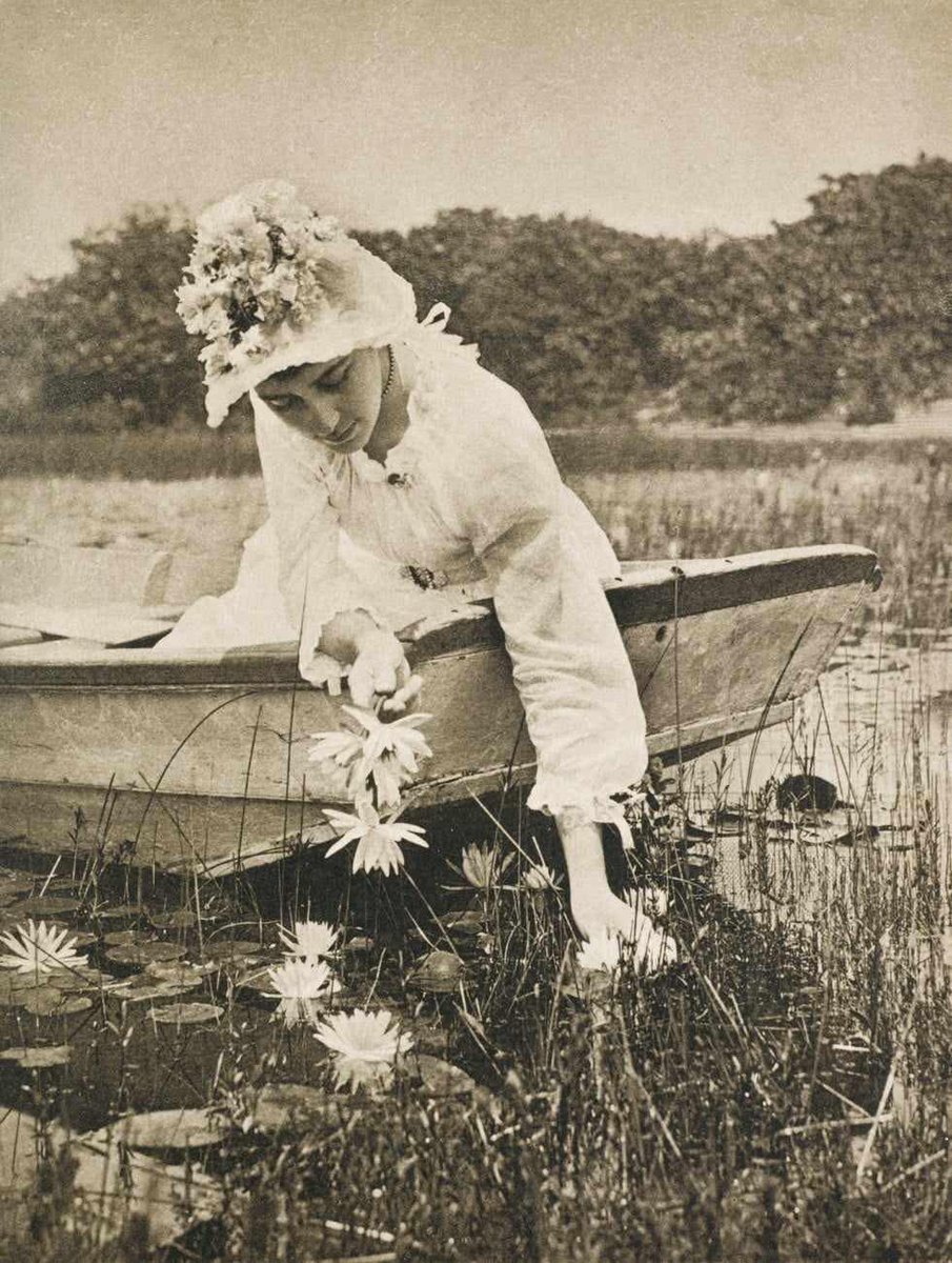 From U.S. History channel:
A lady picking water lilies in 1894