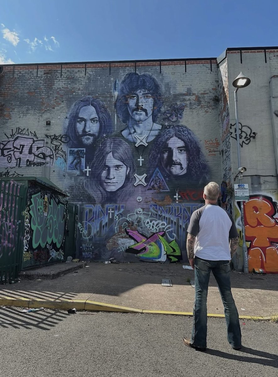 Photomusicrock's tweet image. James Hetfield of Metallica admiring a Black Sabbath mural in Birmingham, he’s carrying the Heavy Metal torch now! © Adriana Gillett.