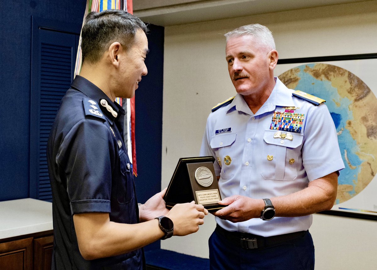 USCGPACAREA's tweet image. The Coast Guard Pacific Area hosted Singapore Police Coast Guard leaders, reinforcing maritime security and training. Vice Admiral Tiongson and Rear Admiral Novak engaged in a gift exchange with Singaporean officials. This partnership strengthens ties between the US and Singapore
