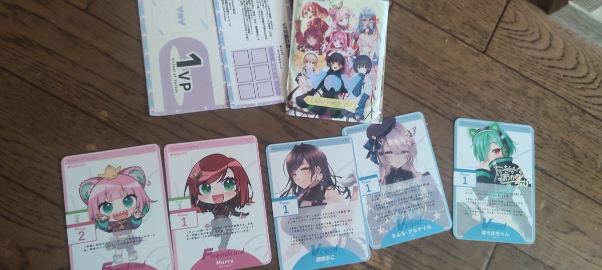 1202ACUA's tweet photo. 先日、名古屋にて開催されたVイベの土産！カードゲームだぜ！
VRチケットを集めると素敵な商品と交換できるんだってー
みんなも買ってみてねー
スターターデッキセット的なのも購入できるそうです！
 #でらみゅv   #LEAFcafe https://t.co/J4r88n9y2i