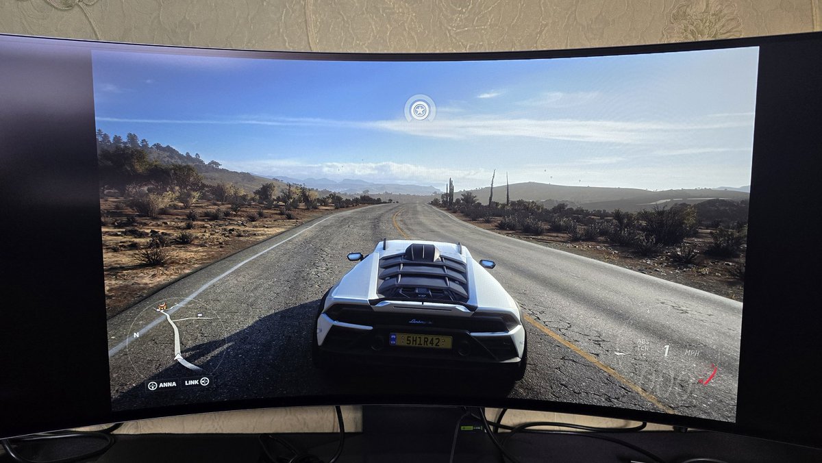MightyThaupe's tweet photo. @Xbox please test and release an update for the series x and games to support ultra wide monitors. This @ForzaHorizon 5 on my ultra wide monitor on the series X and the black side bars are a little annoying. Thanks https://t.co/AAUpG44XIP