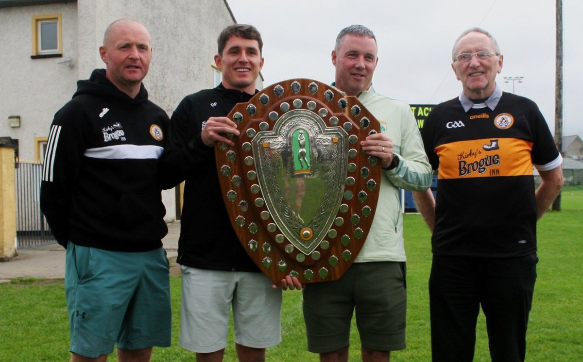 Terence Houlihan, Kerry GAA, 2nd right, presents Ronan Shanahan, Captain of Austin Stacks team, with the Credit Union Senior County  Football League Div 1 Shield at Connolly Park, Tralee on Sunday. Darragh Long, Team Manager on left. Billy Ryle, Club Vice-Chairman on right. 🖤🧡