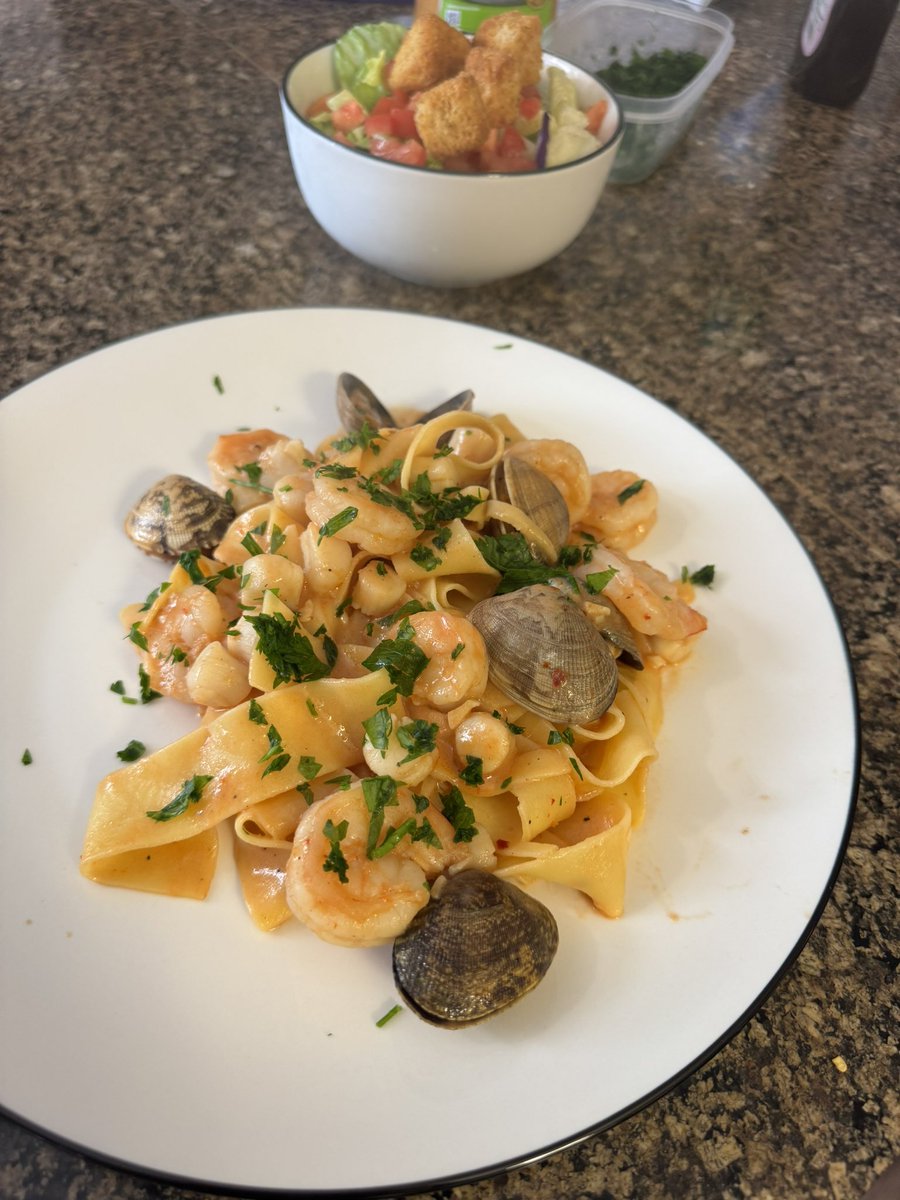 Pappardelle Pasta, scallops, shrimp, clams in a creamy Seafood Sauce

This was my first time making this… it came out 🔥