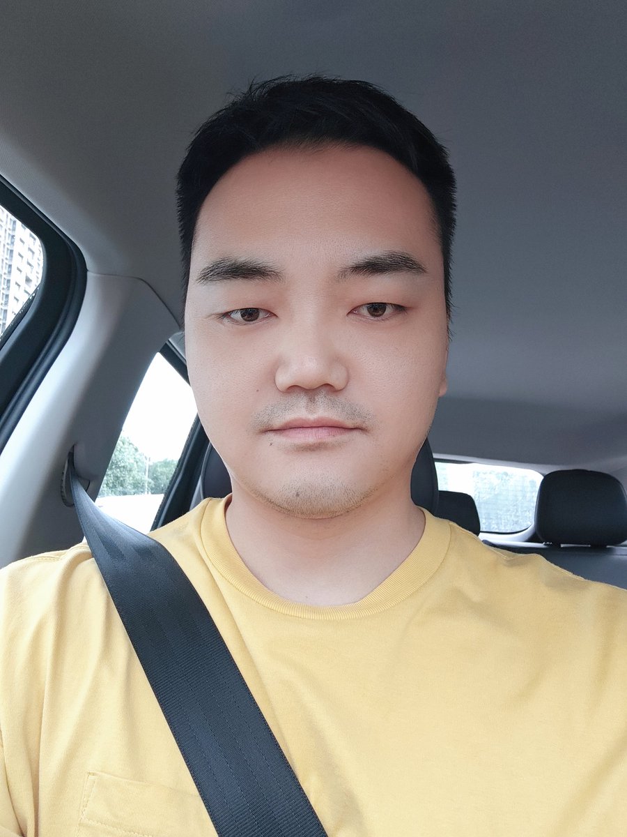 Self-portrait on the way to work,It's hard to say whether i am handsome or not. Show it first.