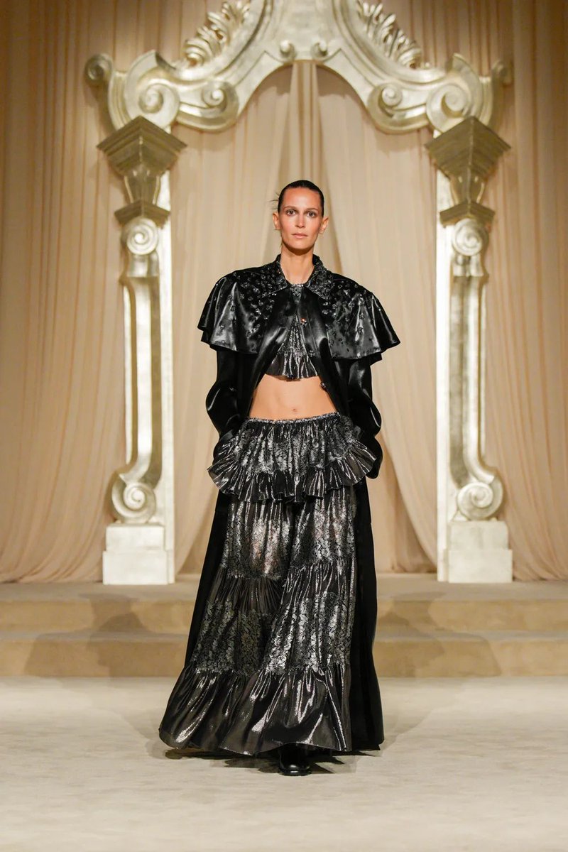 I'm not really a big Chanel fan most of the time but I love this, espcially the shape of the capelet