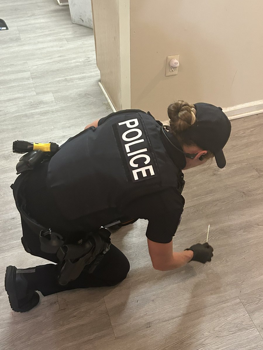 Shift CSI Officer Ellison swabs blood spatter at a recent crime scene. Thorough investigations are a big part of building a successful case. #CSI #SPD