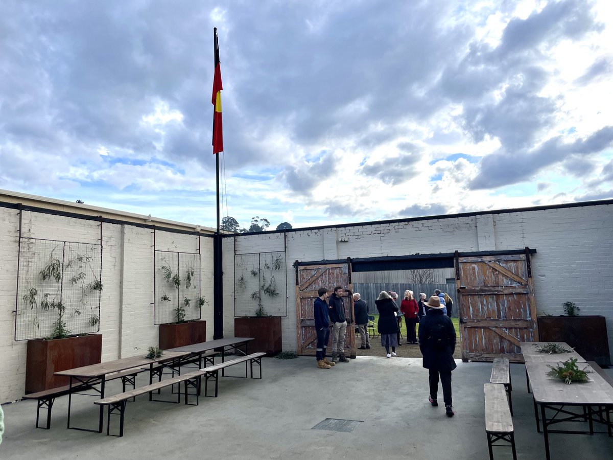 3/4 A big crowd gathered at Port Cygnet Cannery under beautiful wintry skies to celebrate #NAIDOC, raising of the flag; sharing stories, culture and connections 
#MelukerdeeCountry 
#lutruwita