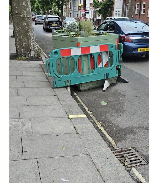 CameraTraffic's tweet image. Sad tale of 3 little planters on Wandsworth Bridge Road. Going, going, gone? @LBHF have already taken away one and two. When is three leaving? Can you imagine how dangerous the chicane that replaces them will be?