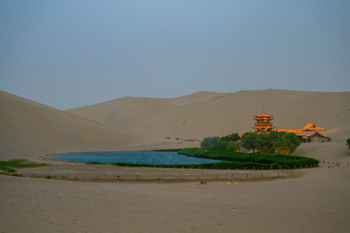 DunhuangAcademy's tweet image. Photoshop magic? Nope — just #Dunhuang’s Mingsha (Singing Sand) Mountain crooning under the sun, and the oasis of Yueyaquan (Crescent Lake) glowing like a sapphire. Nature’s own masterpiece! 🏜️🌊💎
#DunhuangScenery @This_is_Gansu @ExploreGansu @discover_gansu @HiDunhuang