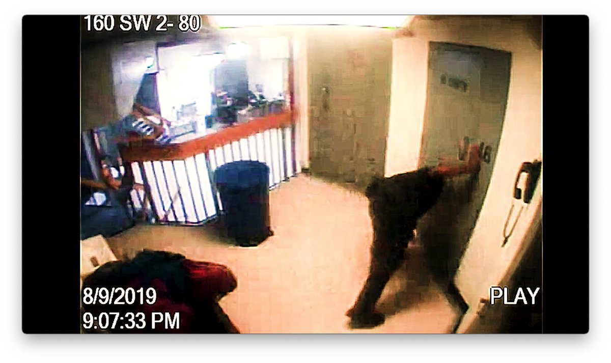 joostgriffioen's tweet photo. what's the mystery letter under door 48? appearing and being picked up at 9:07 PM? #epsteinfootage  #epsteinfiles https://t.co/o9HI21dJK2