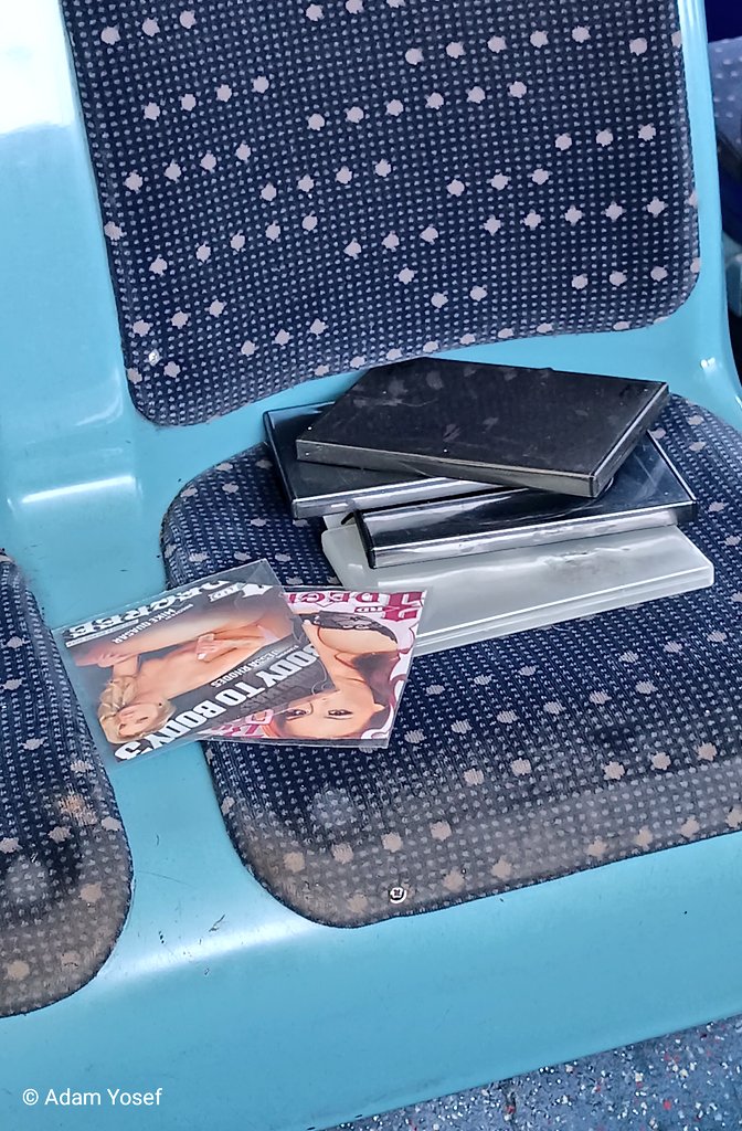 AdamYosefJourno's tweet image. Why's there random abandoned porn DVDs on this bus? I mean, who's watching DVDs in 2025?