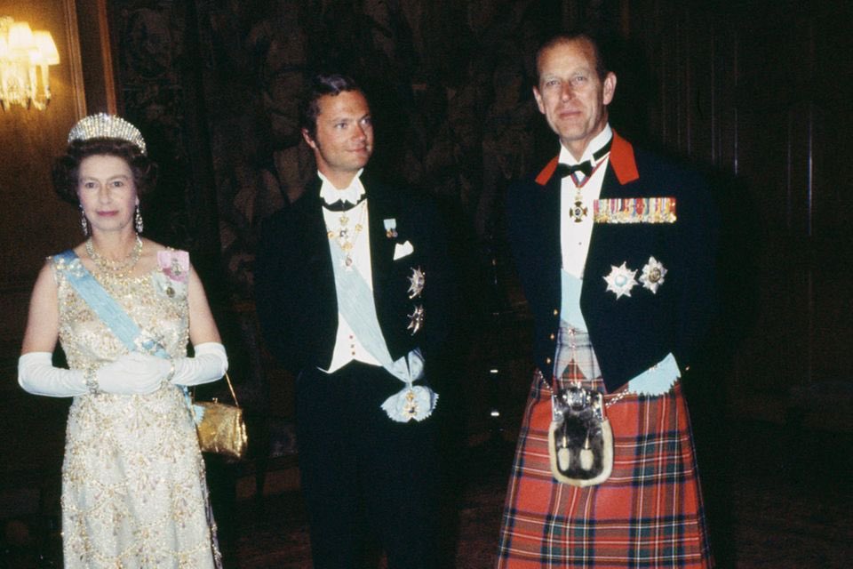 King Carl XVI Gustaf of Sweden visits Queen Elizabeth at Holyroodhouse.