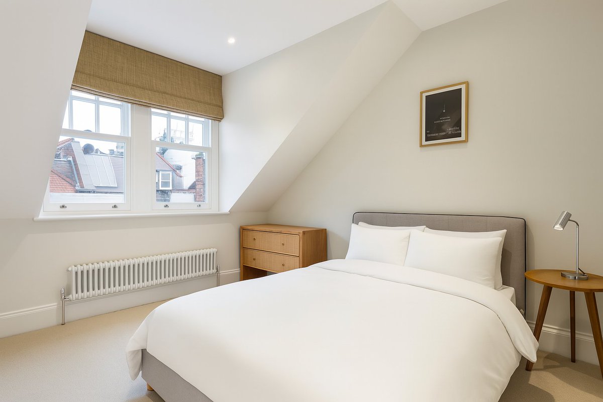 Tucking a studio into an existing roof, just!