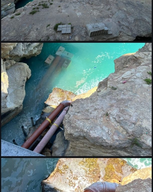 Tigne sea cave: are they polluting with building materials?

White discharge since morning. Normally water is crystal clear. Not normal. Also white foam floating, which never happens.
Pipes put there recently. Always water coming tunnel (aircon?), but never this white.