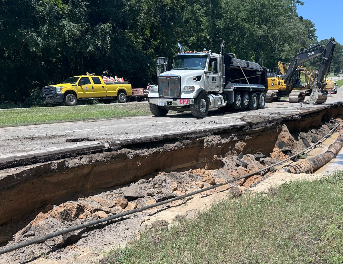 NCDOT's tweet photo. The power of water. 
This is why roads close and you don't go around barricades. 

(📸: Camp Easter Rd. and N.C. 2 in Southern Pines) https://t.co/FAxvRyz2rA