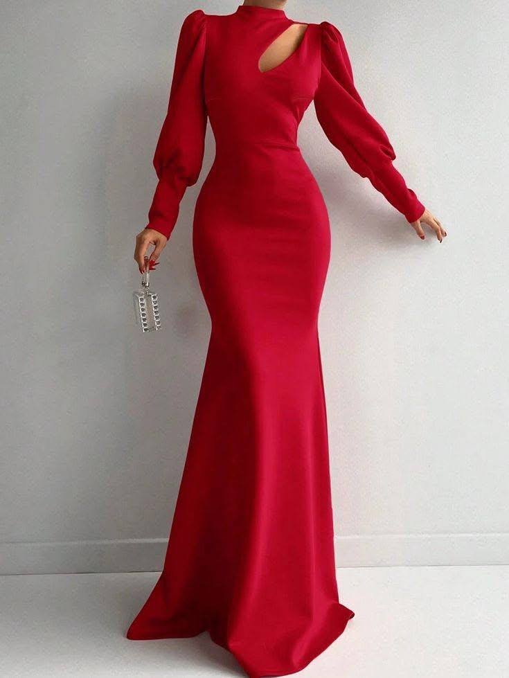 Stunning red gown with elegant cutouts.