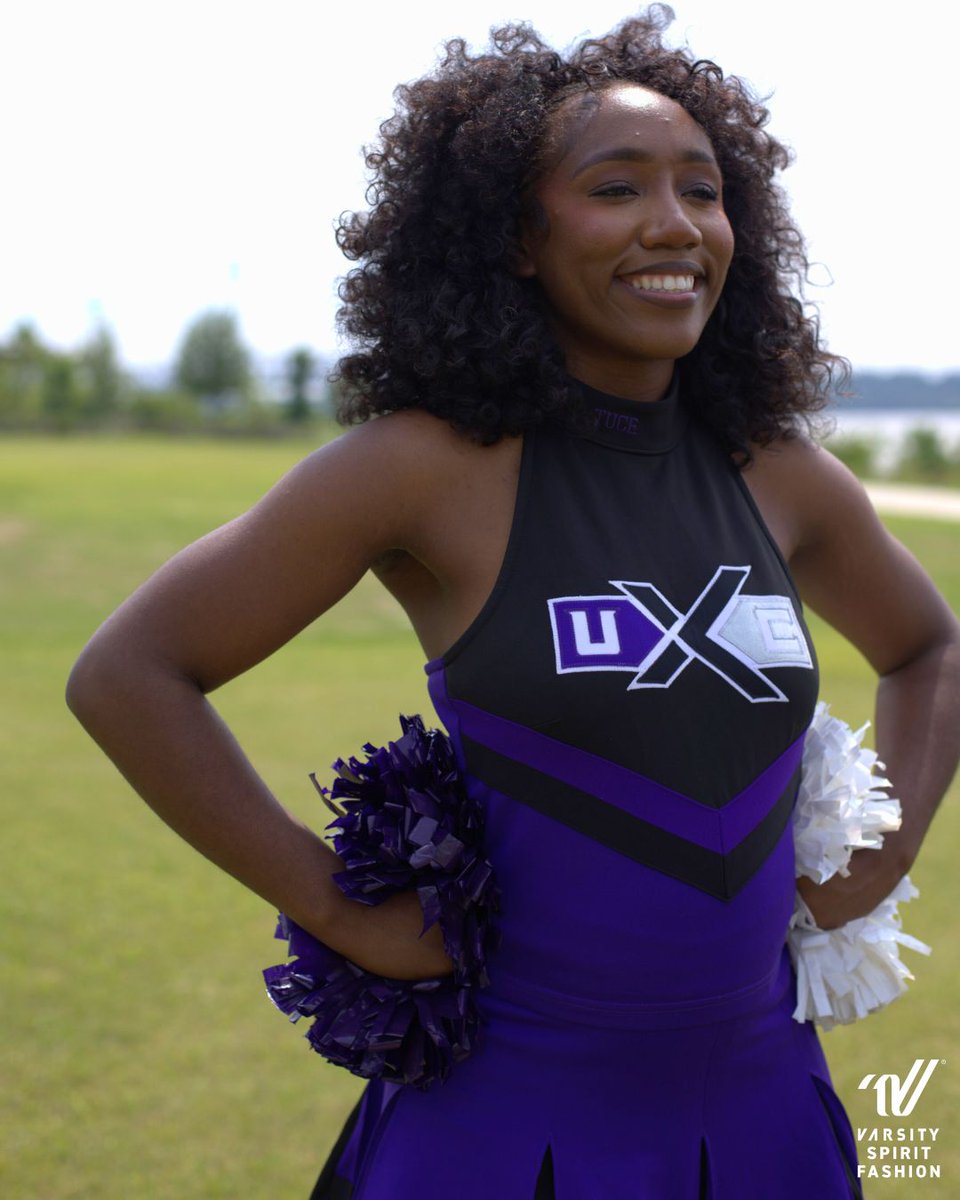 Made for UCE cheer staff, a pleated skirts that pop with every shake, and hidden details on the neckline that honor TUCE—Tradition, Unity, Character, Excellence. #VarsityStyle 🖤💜 <a href="/VarsitySpirit/">Varsity Spirit</a>