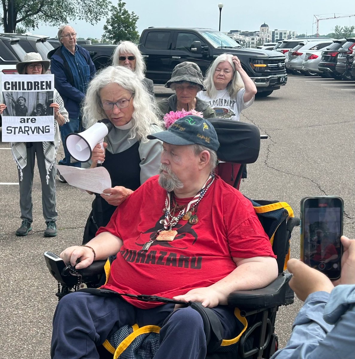 Bill Hatton, a Vietnam veteran nearly completely paralyzed by Agent Orange, is anticipating death. His final wish was to protest war with his VFP comrades. His medical condition made that inadvisable. So we decided to come to him, moving our vigil for Gaza near the MN Vets Home.