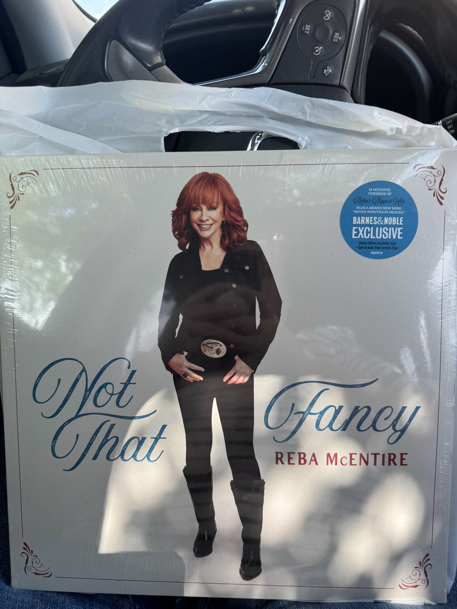 tish_cowboysfan's tweet image. Do I already have the blue version of #NotThatFancy on vinyl? Yes. 
Did my local B&amp;amp;N have the exclusive w/ the audio book excerpts 3rd vinyl on sale for $20? Also, yes. 
Did I buy it? Again, yes. #Reba