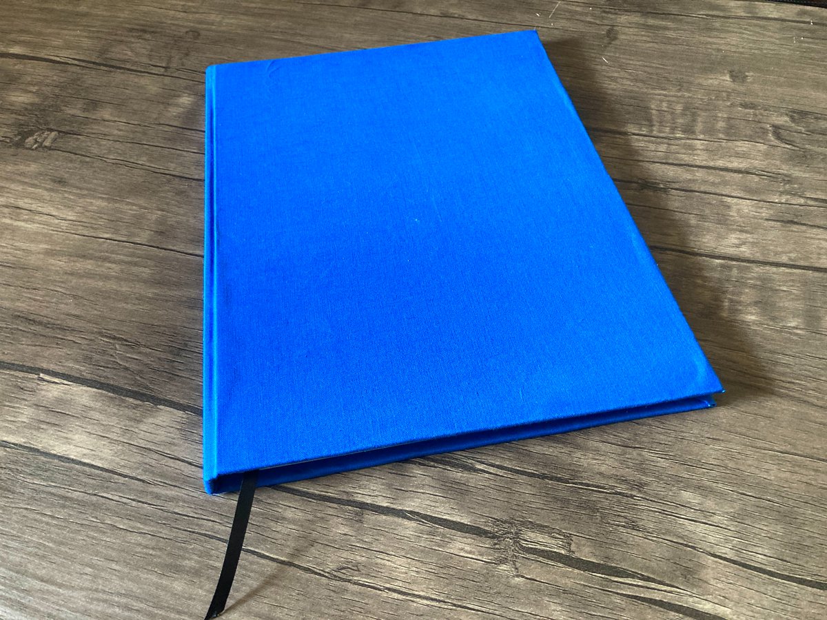 KeyeMartin's tweet image. The outside is draped in blue cloth and left purposefully blank as a reminder that the inside is what matters most; it’s made from cardboard so firm that it can balance an empty red wine bottle without bending.

(Part 1 of 5)