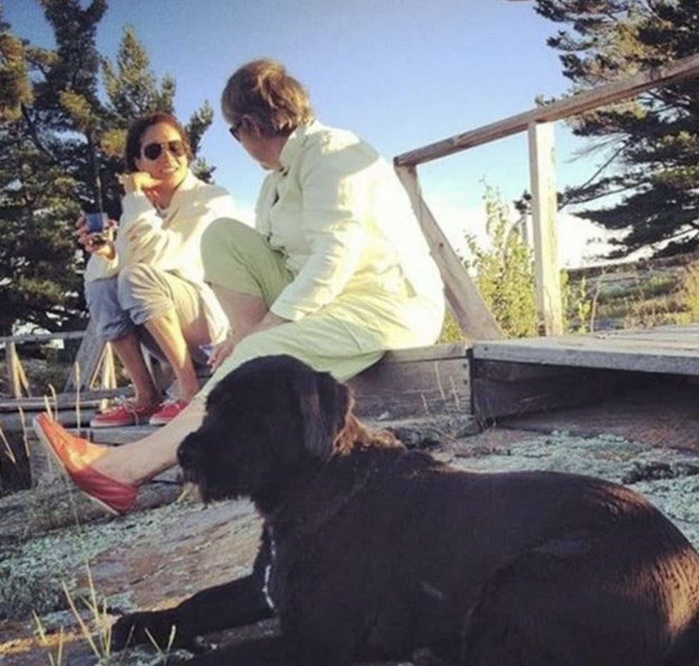 Is it me or does the dude in the pic with Meghan Markle look like Elton John…