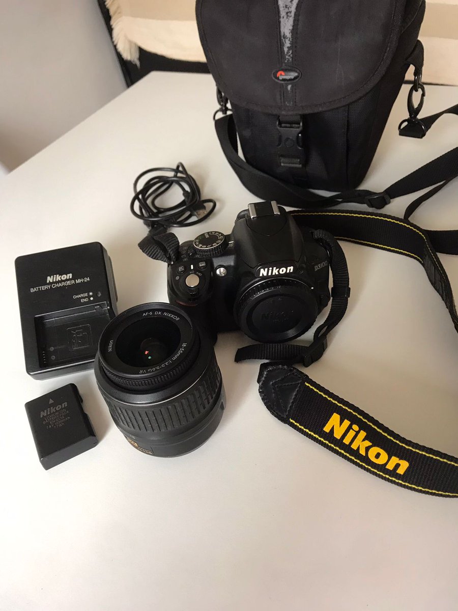 Vendo cámara Nikon D3100, con lente 18-55.  Impecable, se va con todos sus accesorios, batería y cargador originales.
