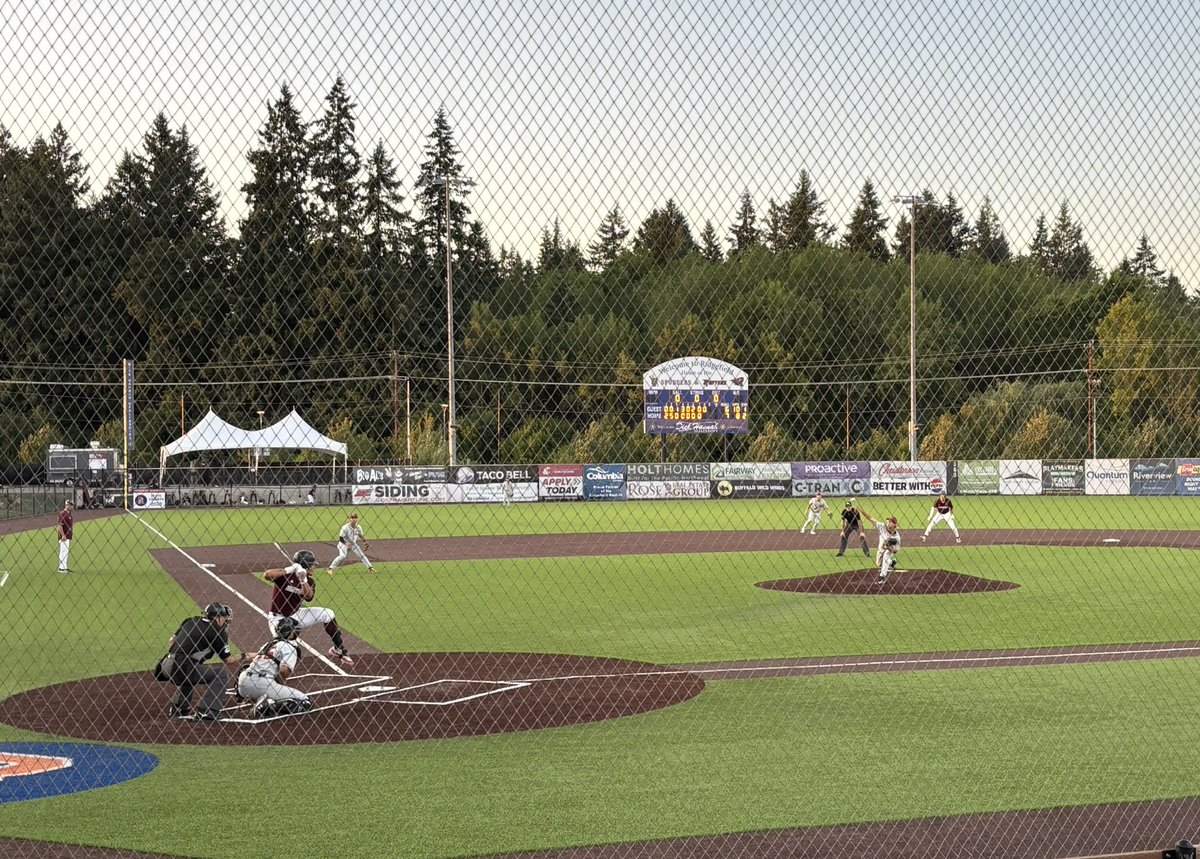 Corvallis holds on to take game one of its series with Ridgefield, 11-9.