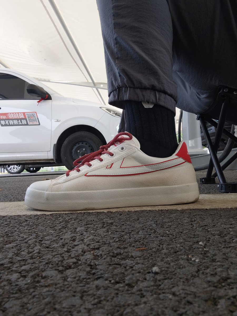 This brand is Warrior (回力）, founded in 1927, with low price. This style is the most classic one.Have you seen this brand in your country?