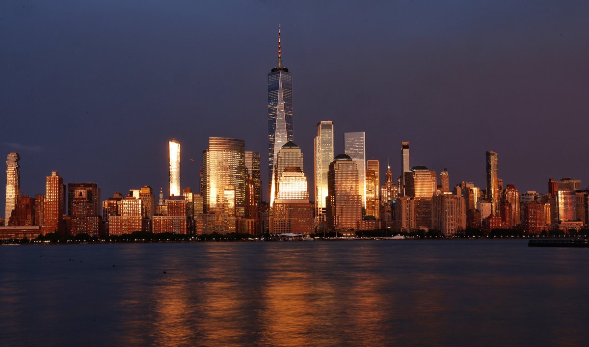 The sky over lower Manhattan and One World Trade Center went from the dark clouds of a thunderstorm to a golden sunset in 30 minutes in New York City, Tuesday evening #newyorkcity #nyc #newyork #thunderstorm #sunset
