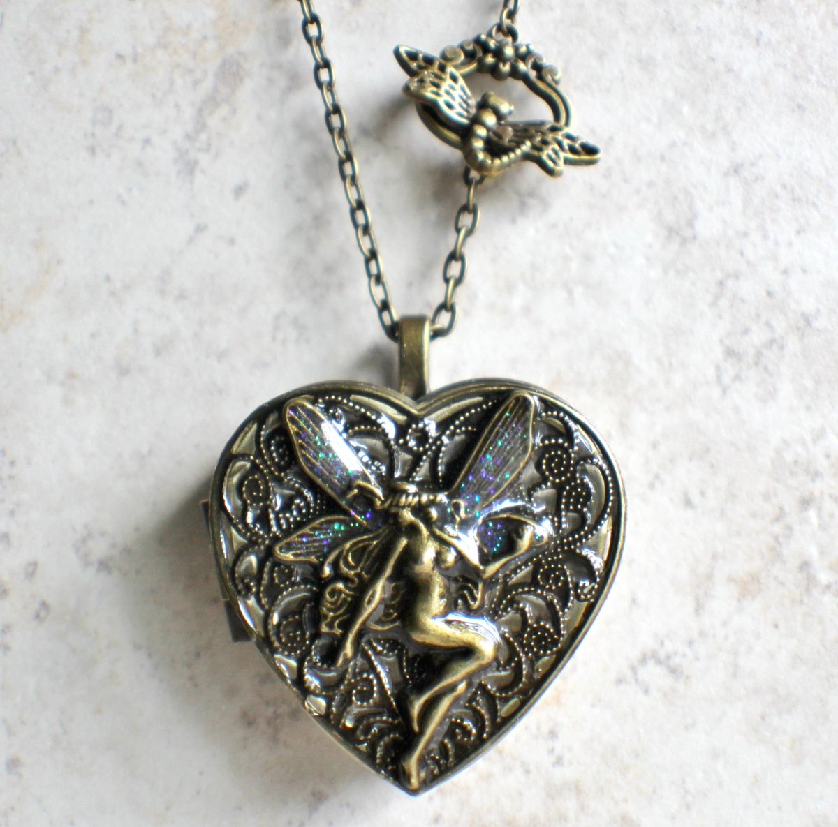 #jewelry #Collectible Bronze Fairy Music Box Locket
$100.00
Get here bit.ly/30djlUa