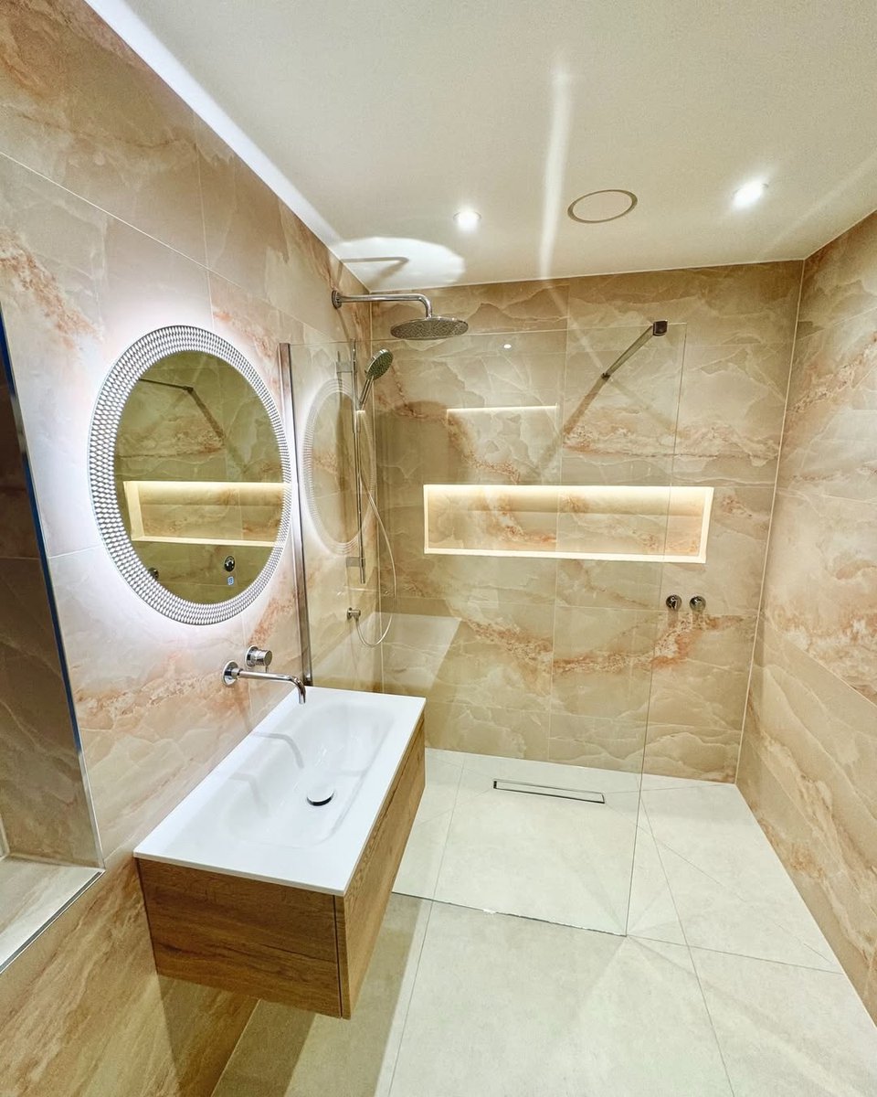 Amber marble + pink veining + cosy Warmup underfloor heating = bathroom goals ✨
No more cold tiles. Just pure comfort.
Get a quote: hubs.la/Q03wbsGF0

Installed by: @9yardsconstruction

#BathroomDesign #UnderfloorHeating #HomeGoals #WarmTiles